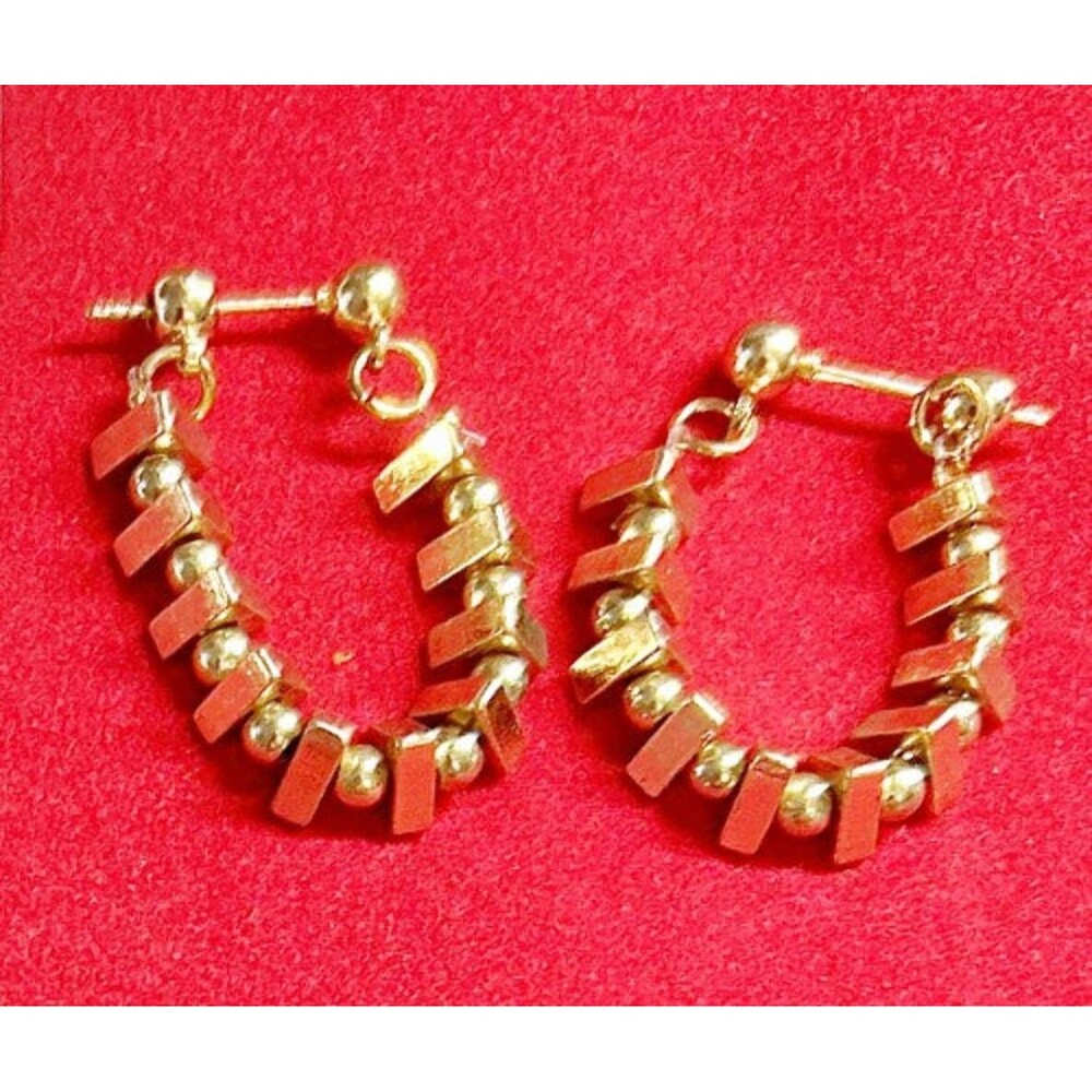 Post- strung finding on hoop earring